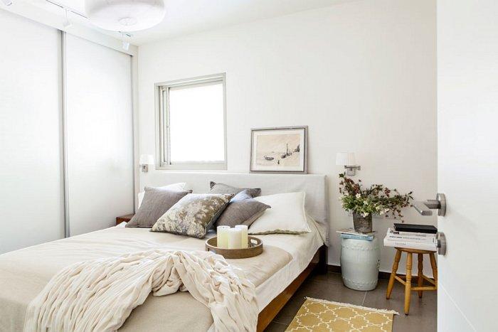 Eclectic small bedroom with simple interior in white