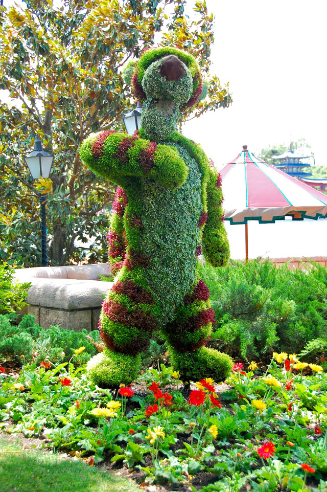 Garden art sculpture - funny creature that walk in the flowers