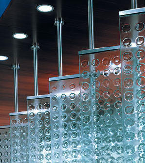 Glass Fence Made Of Several Panels That Hang From The Ceiling