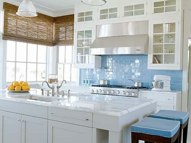 Kitchen design in a traditional home with sea blue and white colors