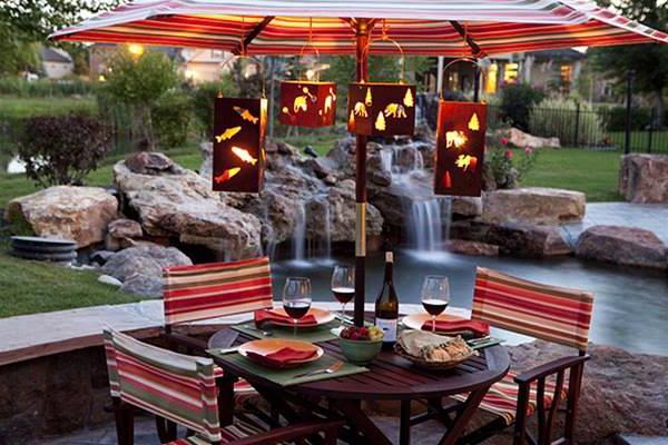 Outdoor dining are with small table near the pond