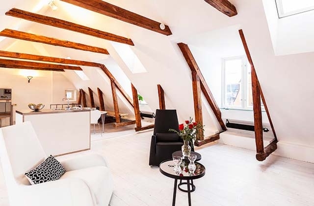 Scandinavian room with white sofa and black modern chair