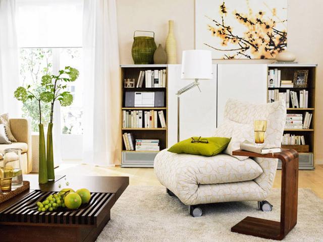 Small living room with modern creative wooden coffee tables and flowers