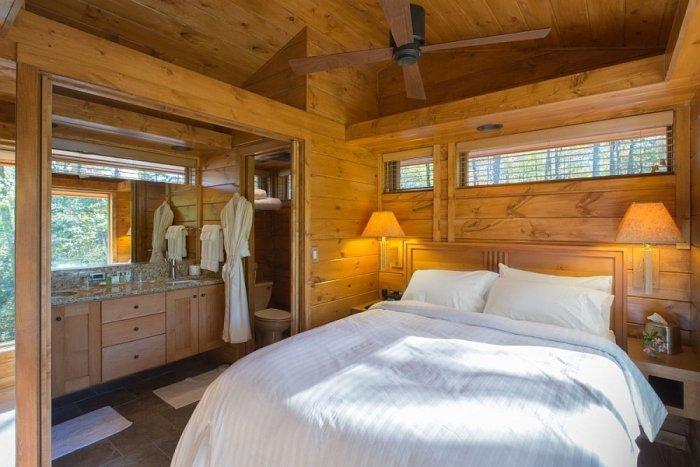 Wooden forest house and its bedroom and bathroom