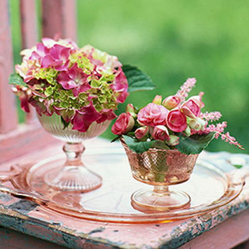 Beautiful flowers placed in bows for fruits and decorating a small plate