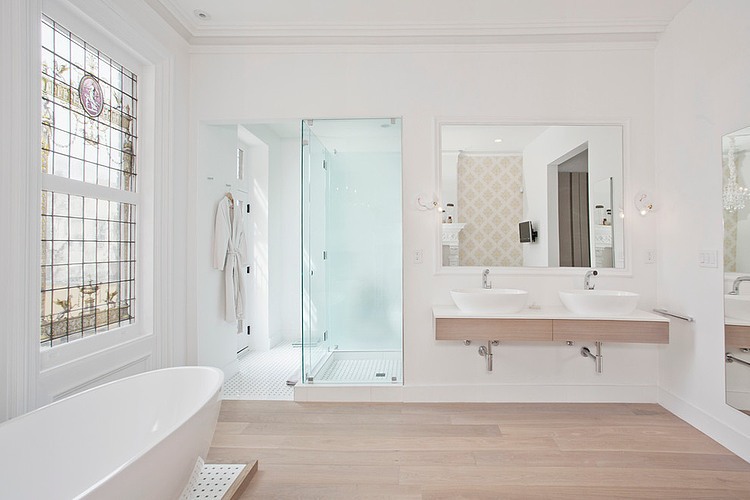 Eclectic bathroom in white with bathtub