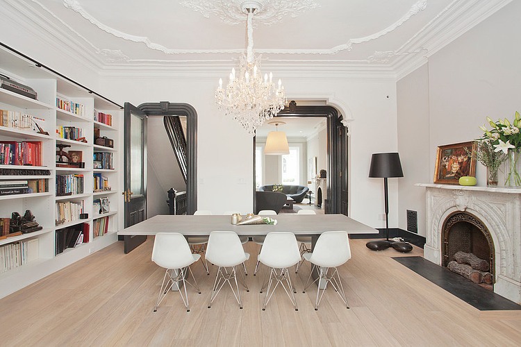 Eclectic living room in white with classic chandelier