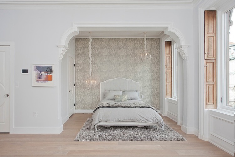 Eclectic white bedroom with traditional accents