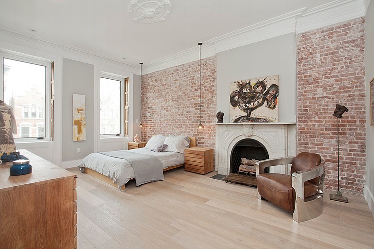 Ecletic bedroom in white with brick walls