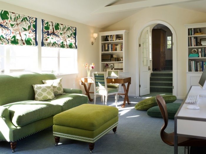 Modern feminine home working room with green accents