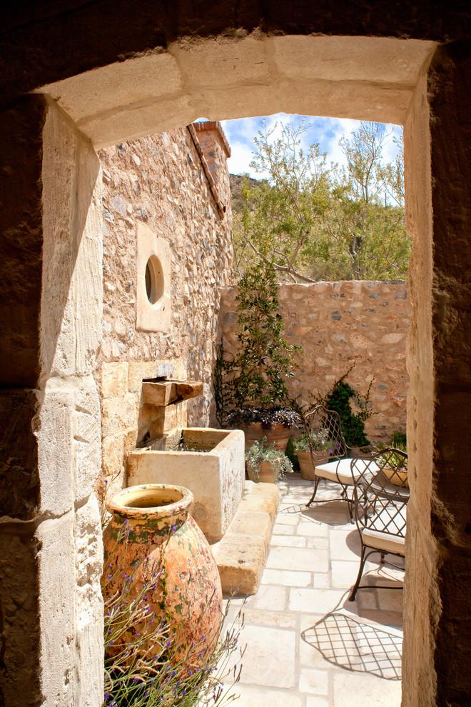 Moroccan garden design with the typical for the culture clay vessels for water