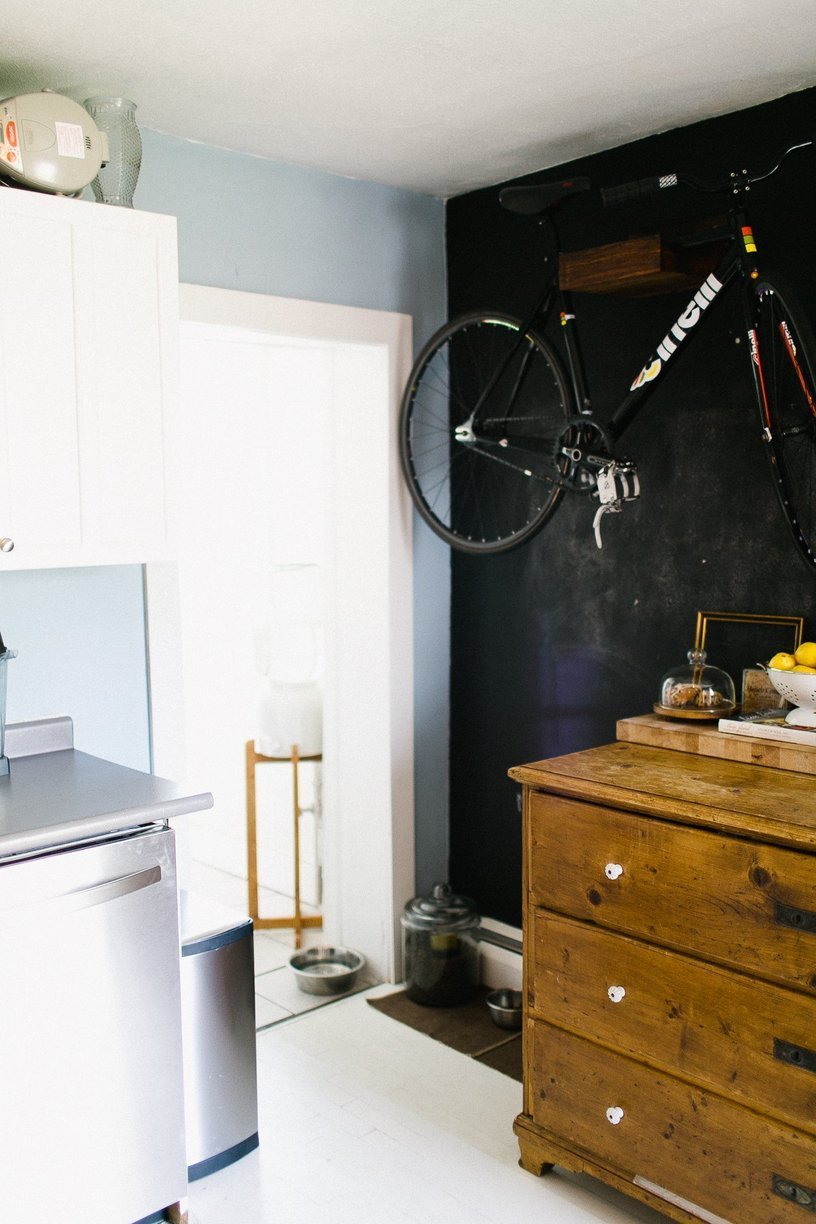 Bike hanged on the wall for saving space