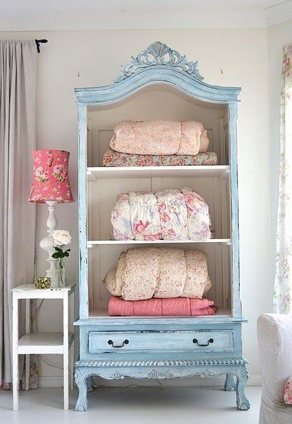 Blue storage chest in a bedroom closet