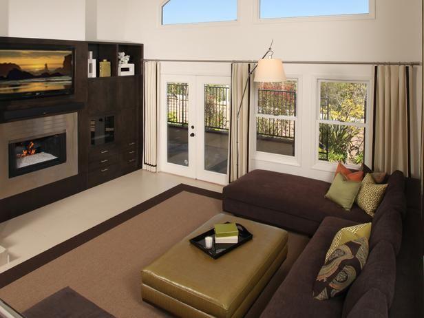 Brown cupboards and sofas in a living room interior