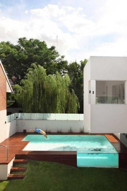 Contemporary pool with glass side