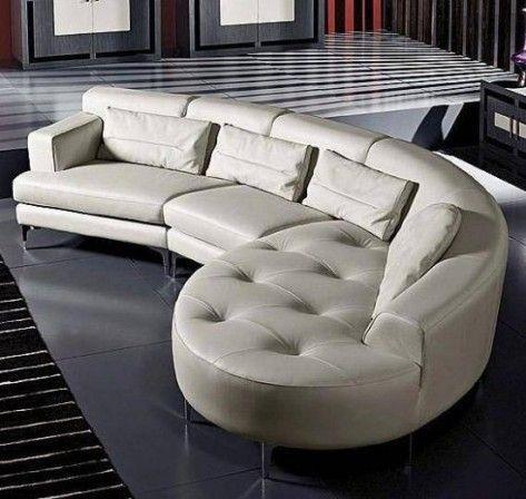 Contemporary white leather sofa placed in a minimalist home