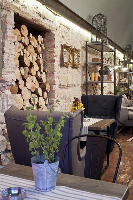 Cozy cafe interior with dark armchairs