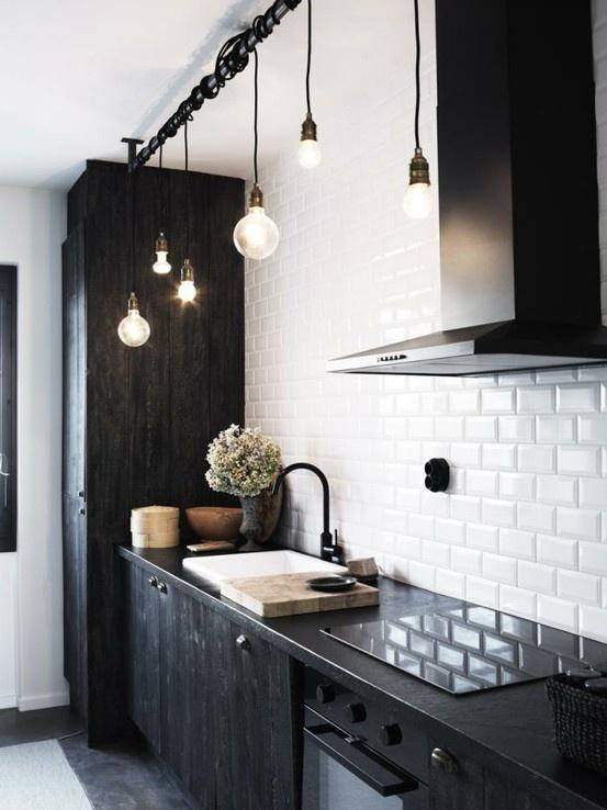 Cozy kitchen design in black and white colors