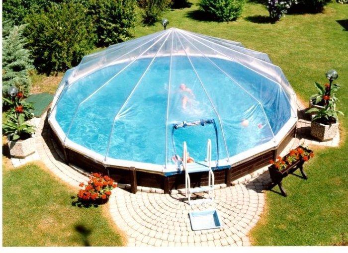 Creative pool with transparent shelter