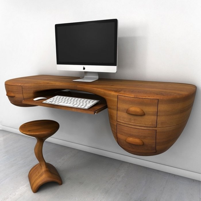 Creative wood desk with apple monitor on it