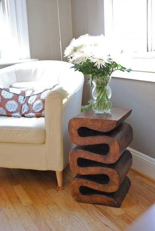 Creative wood table used as a base for flower decorations