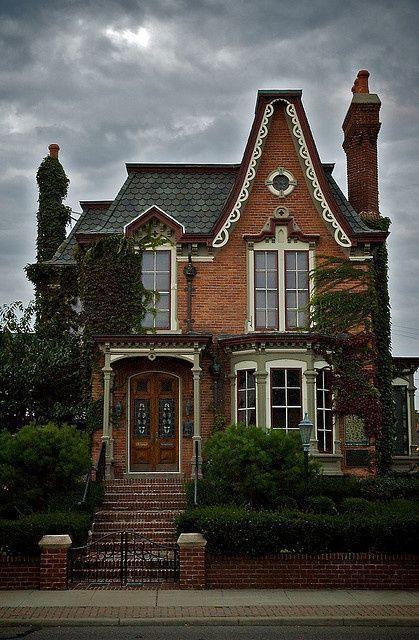 Creepy Victorian house in a cloudy day