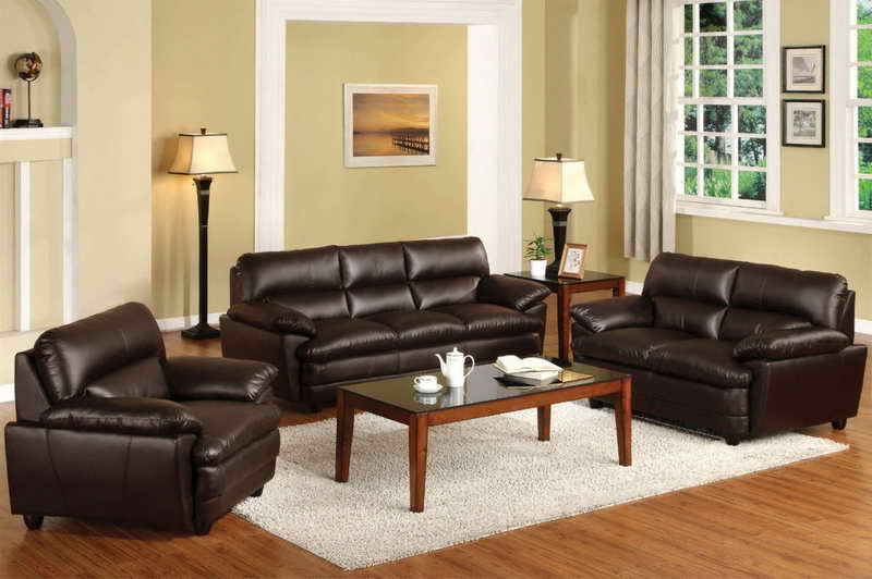 Dark brown leather sofas in a house living room