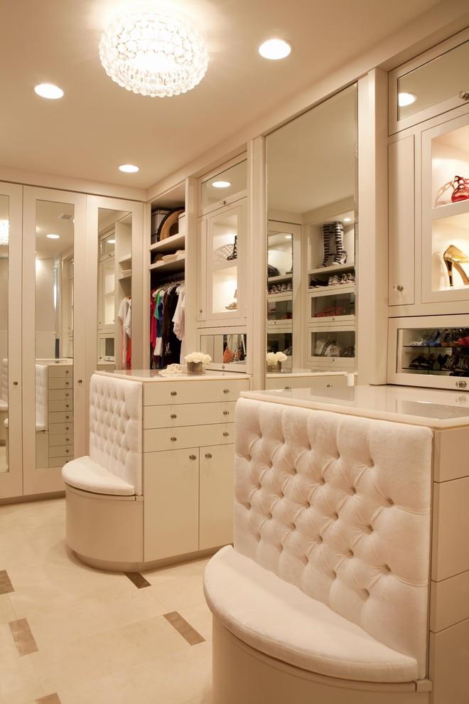Display cabinets inside a glossy bedroom closet