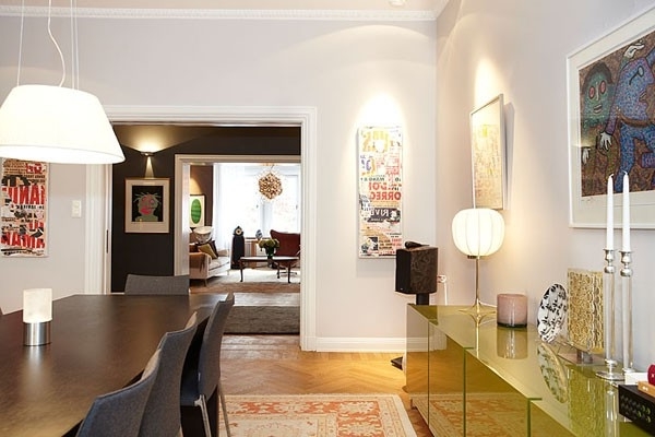 Eclectic dining room with modern yello drawers