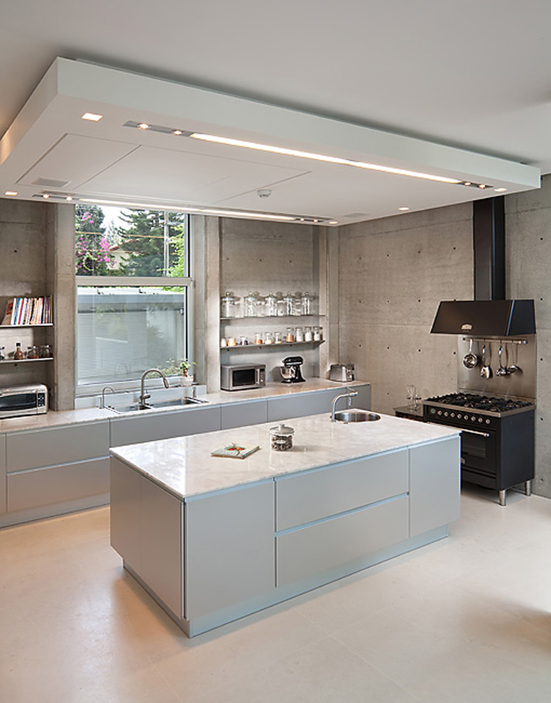 Elegant and stylish white kitchen with huge island in the middle