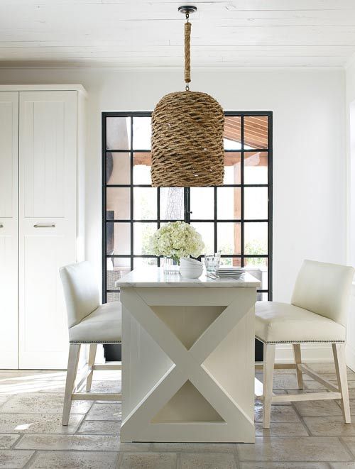 French kitchen design with white table and chairs