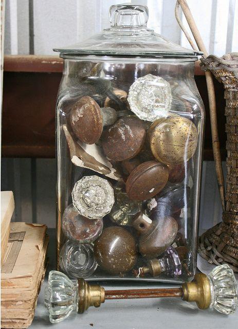 Jar with vintage decorations placed on a table