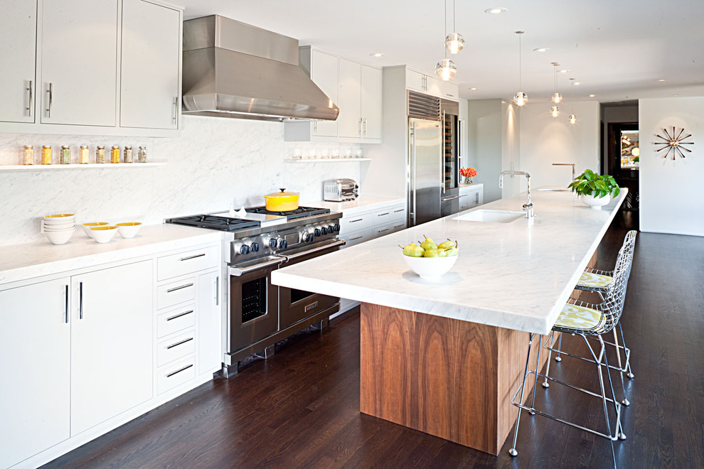 Long kitchen island with marble countertop