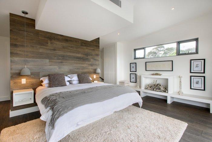 Master bedroom interior with rustic and natural elements