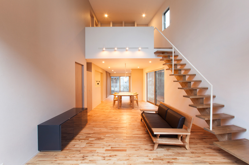 Minimalist Japanese living room located on the first floor