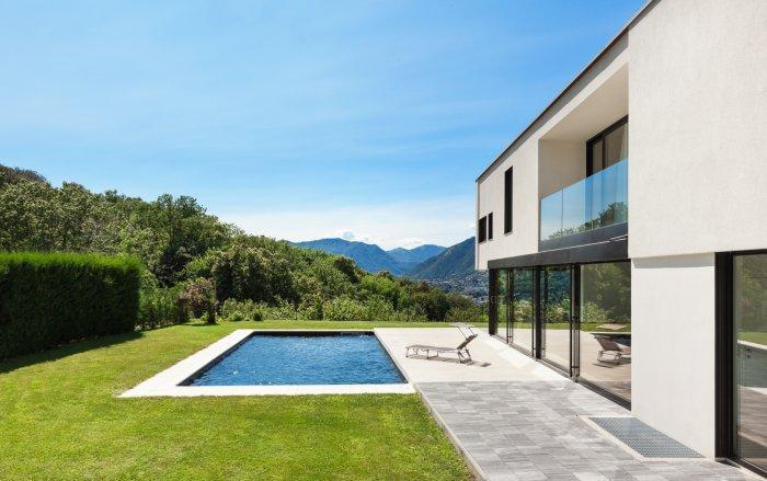 Modern villa with pool, view from the garden