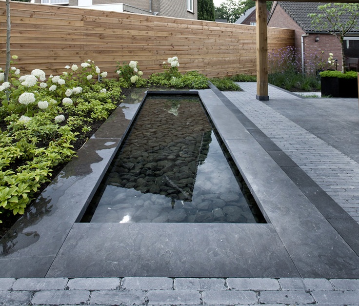 Minimalist pool with pebbles on the bottom