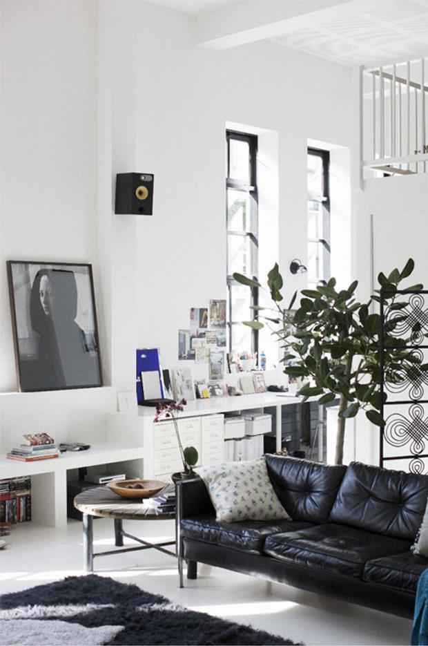 Modern Black Leather Sofa In A Stylish Scandinavian Home