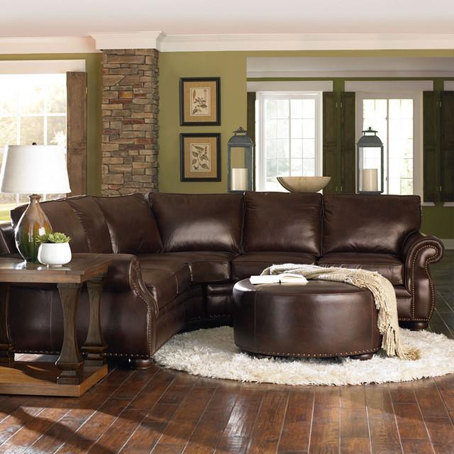 Modern brown leather sofa inside a living room