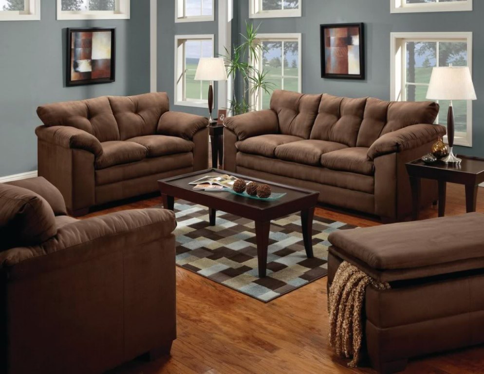 Modern brown living room with dark sofas