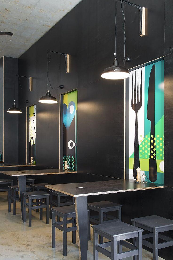 Modern office canteen with interesting wall decorations