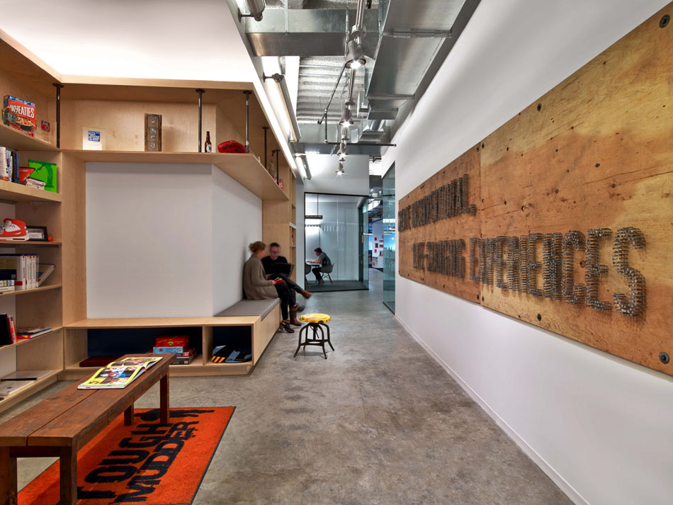 Modern office hallway with wooden board on the wall