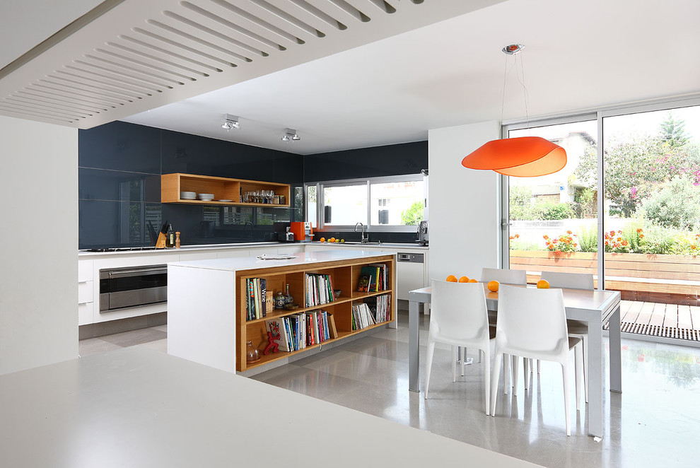 Modern pendants and furniture in a contemporary kitchen