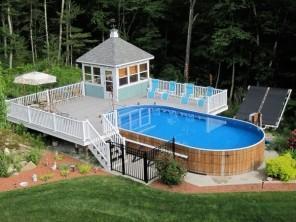 Pool with wood cladding created in the backayrd | | Founterior