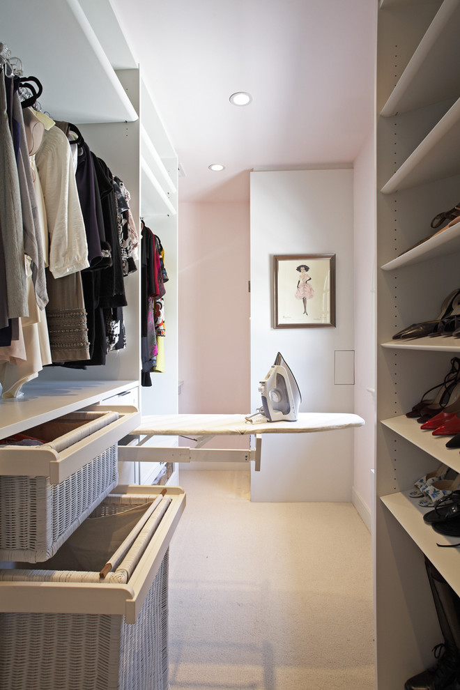 Pullout ironing board in a woman closet