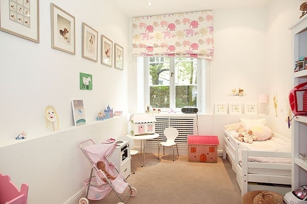 Scandinavian baby room design in white