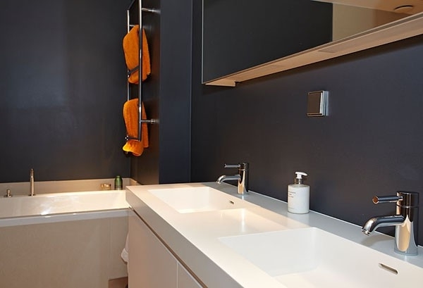 Scandinavian bathroom with white cabinets