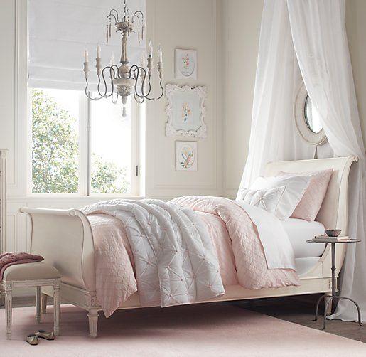 Shabby chic bedroom with white and pink sheets