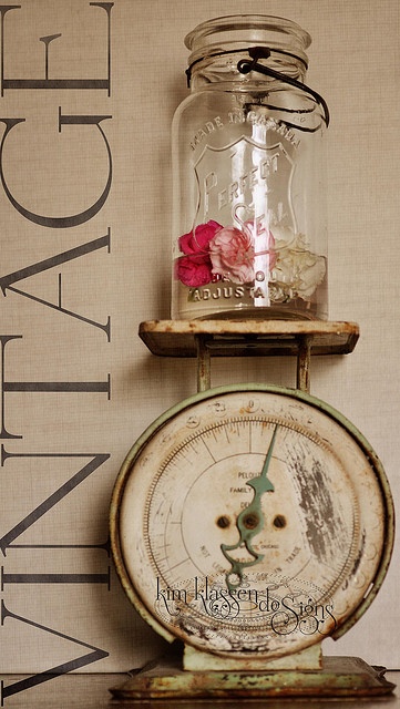 Shabby chic jar palced on scales