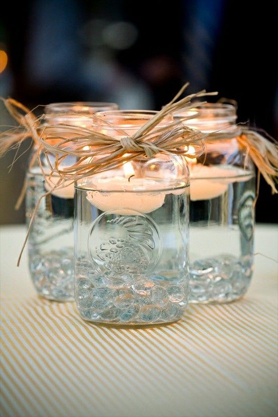 Shabby chic jars used as candleholders